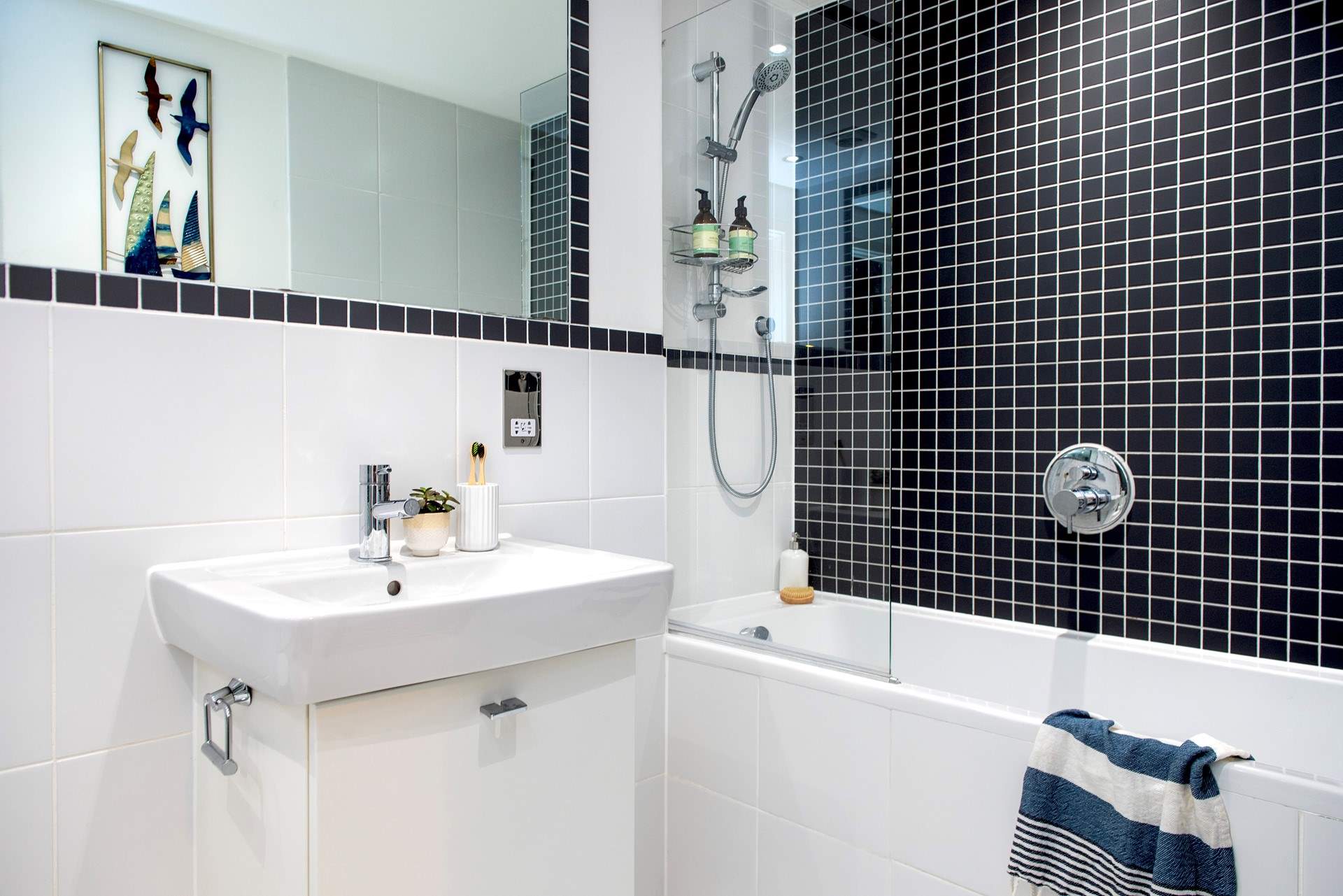 The sleek modern bathroom.
