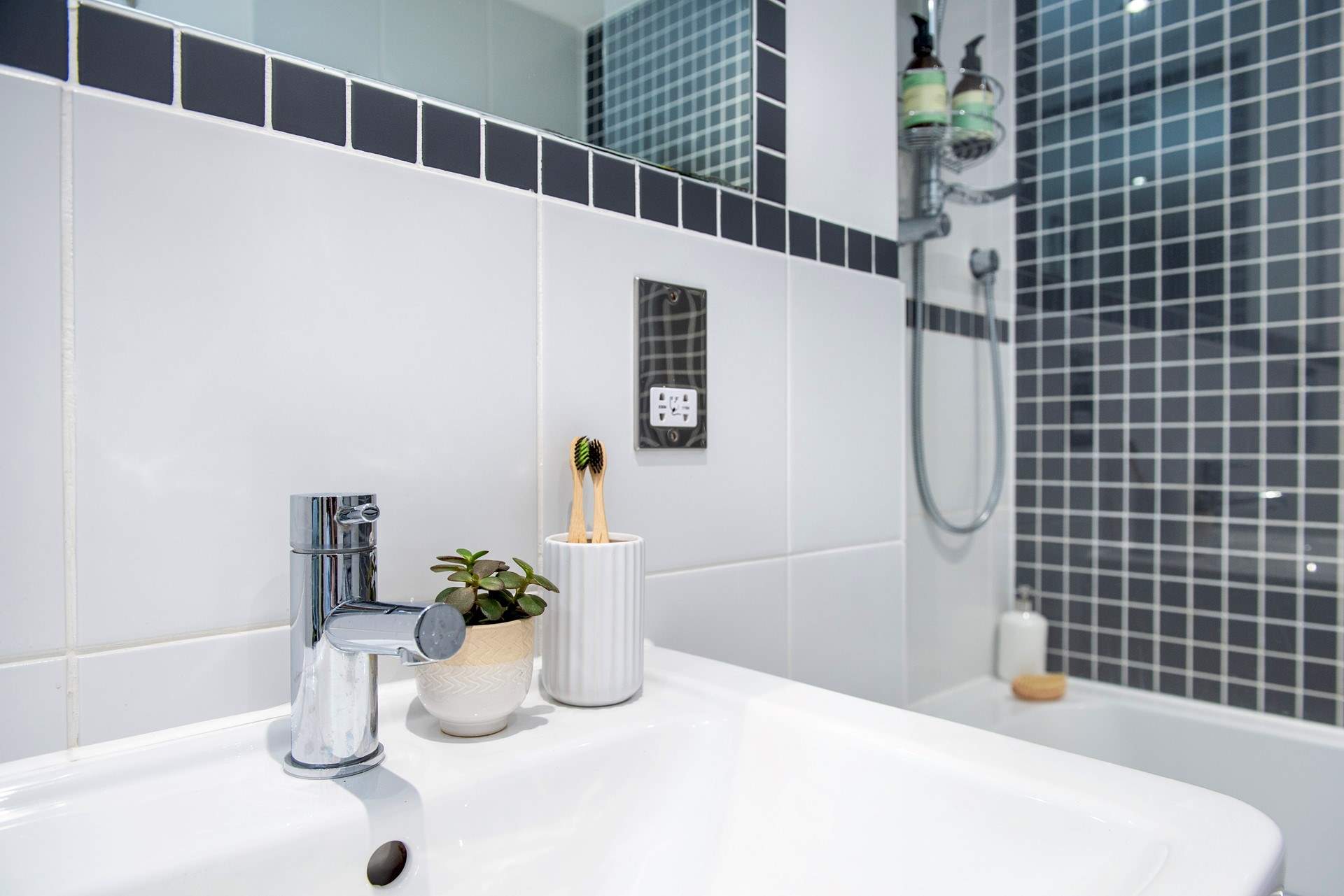 The bathroom has a bath for long leisurely soaks and a shower for a quick morning freshen-up.