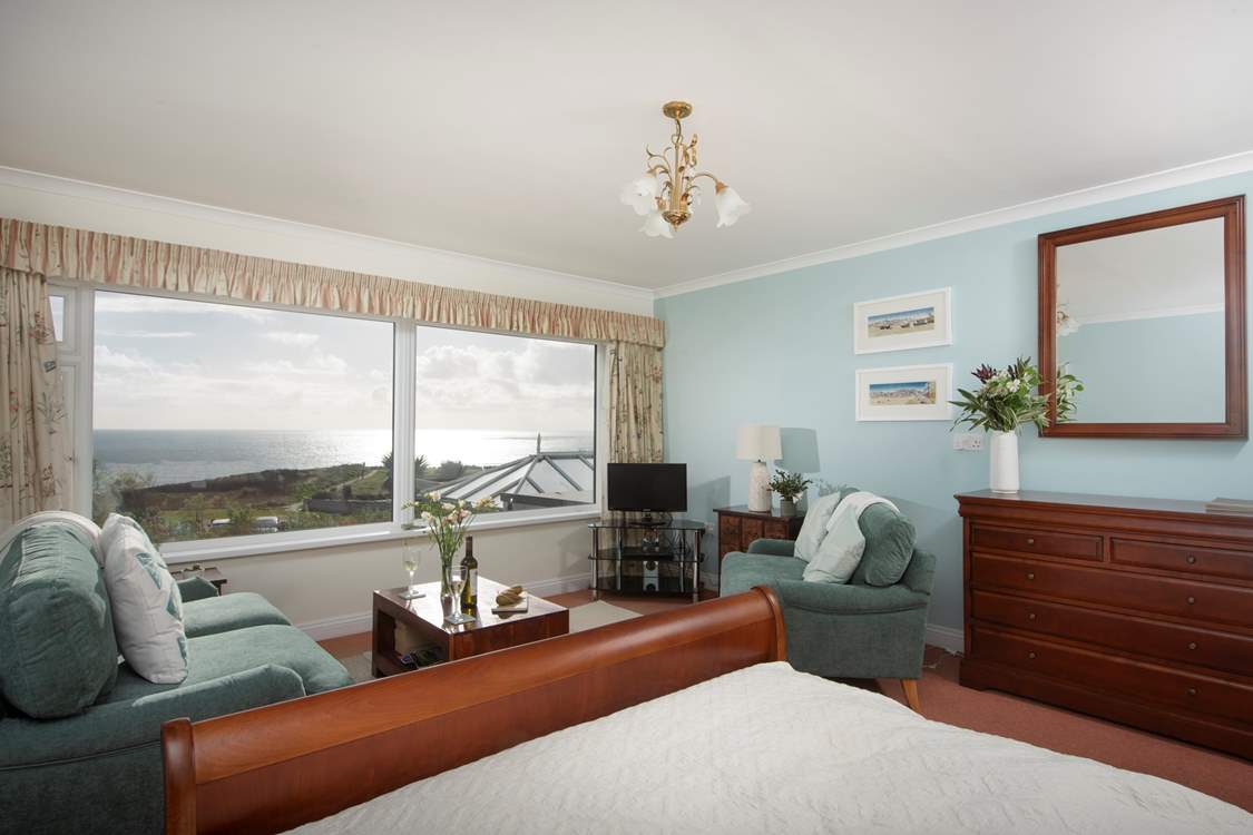 The sitting area is very comfortable and is positioned to take in that view!