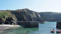 The pretty fishing village of Mullion is just a short drive away.