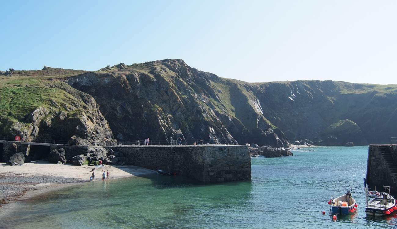 The pretty fishing village of Mullion is just a short drive away.