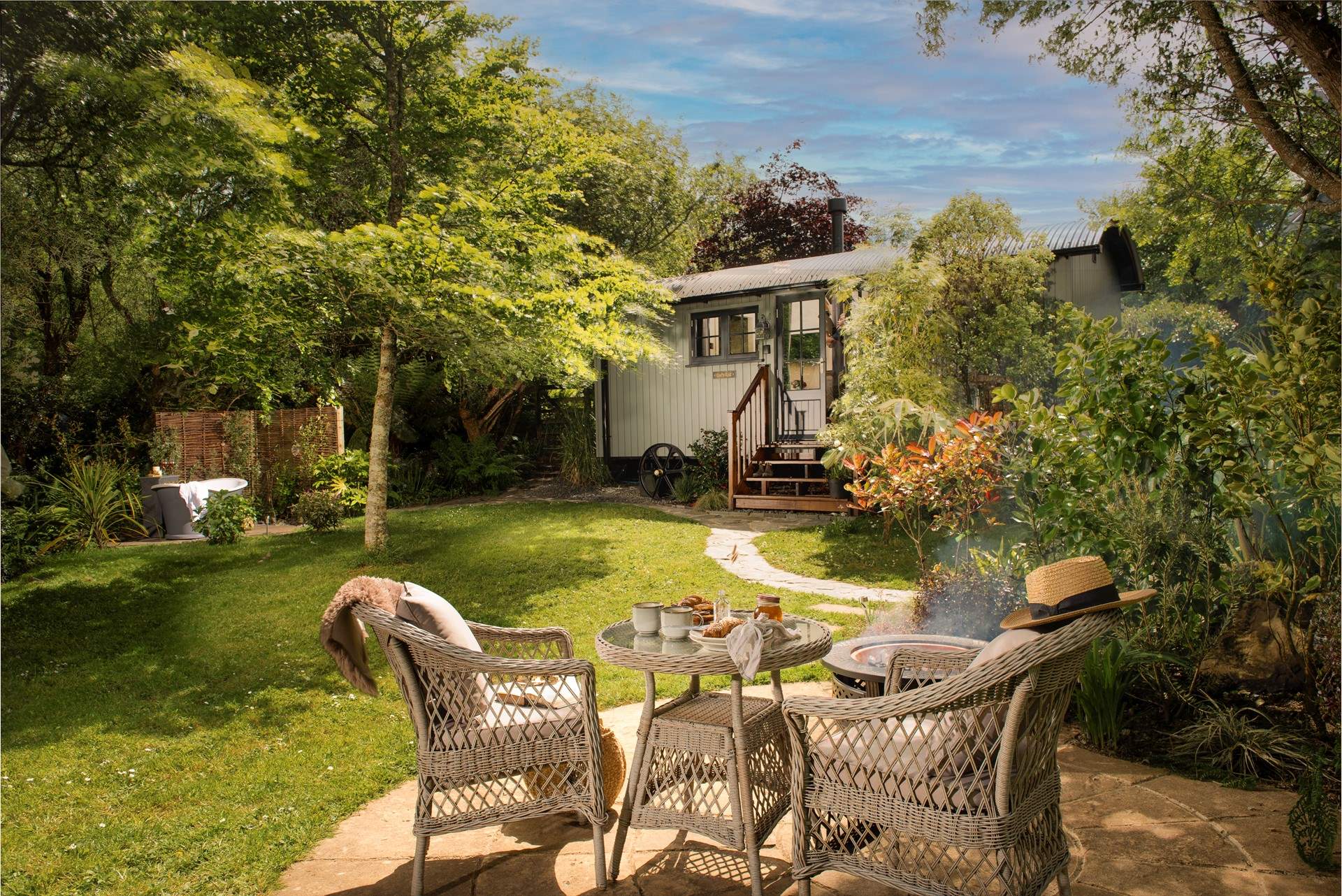 Welcome to Owl’s Rest, an enchanting hideaway nestled in a pretty garden.