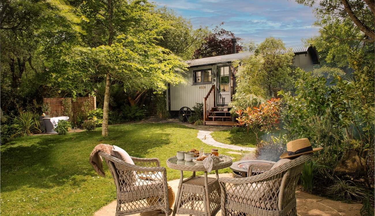 Welcome to Owl’s Rest, an enchanting hideaway nestled in a pretty garden.