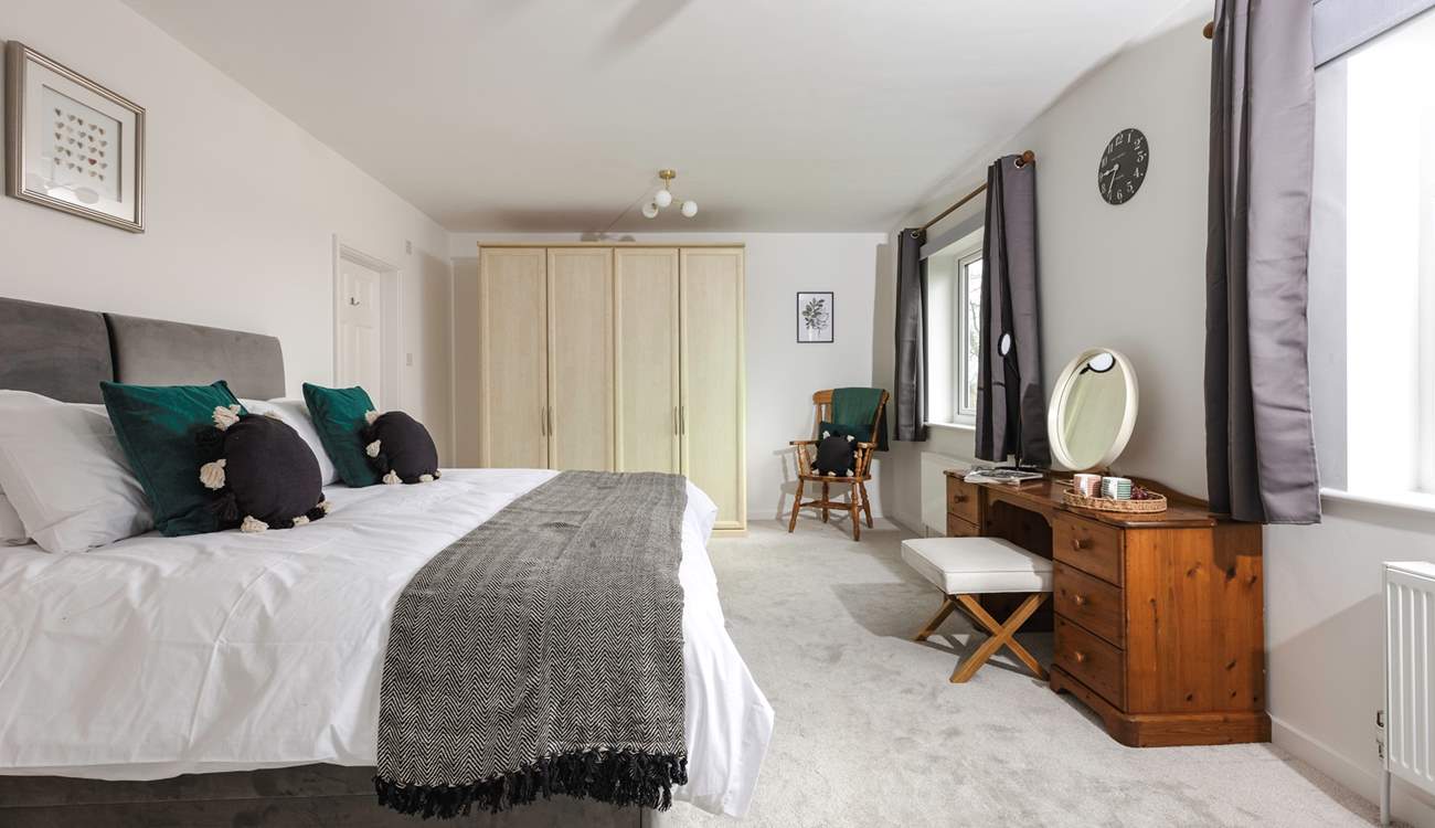 Bedroom one has an en suite shower-room and views over the surrounding countryside. This room can also be made up as a twin.