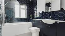 The bathroom has been finished to a high standard.