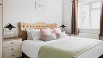 Bedroom 4 - a pretty and calm space to relax at the end of a busy day.