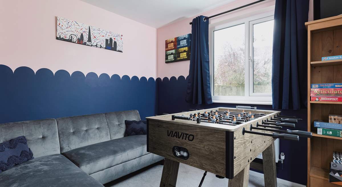 The games-room - off the sitting-room - has table-football and a TV so kids (big or small) can have some fun together.