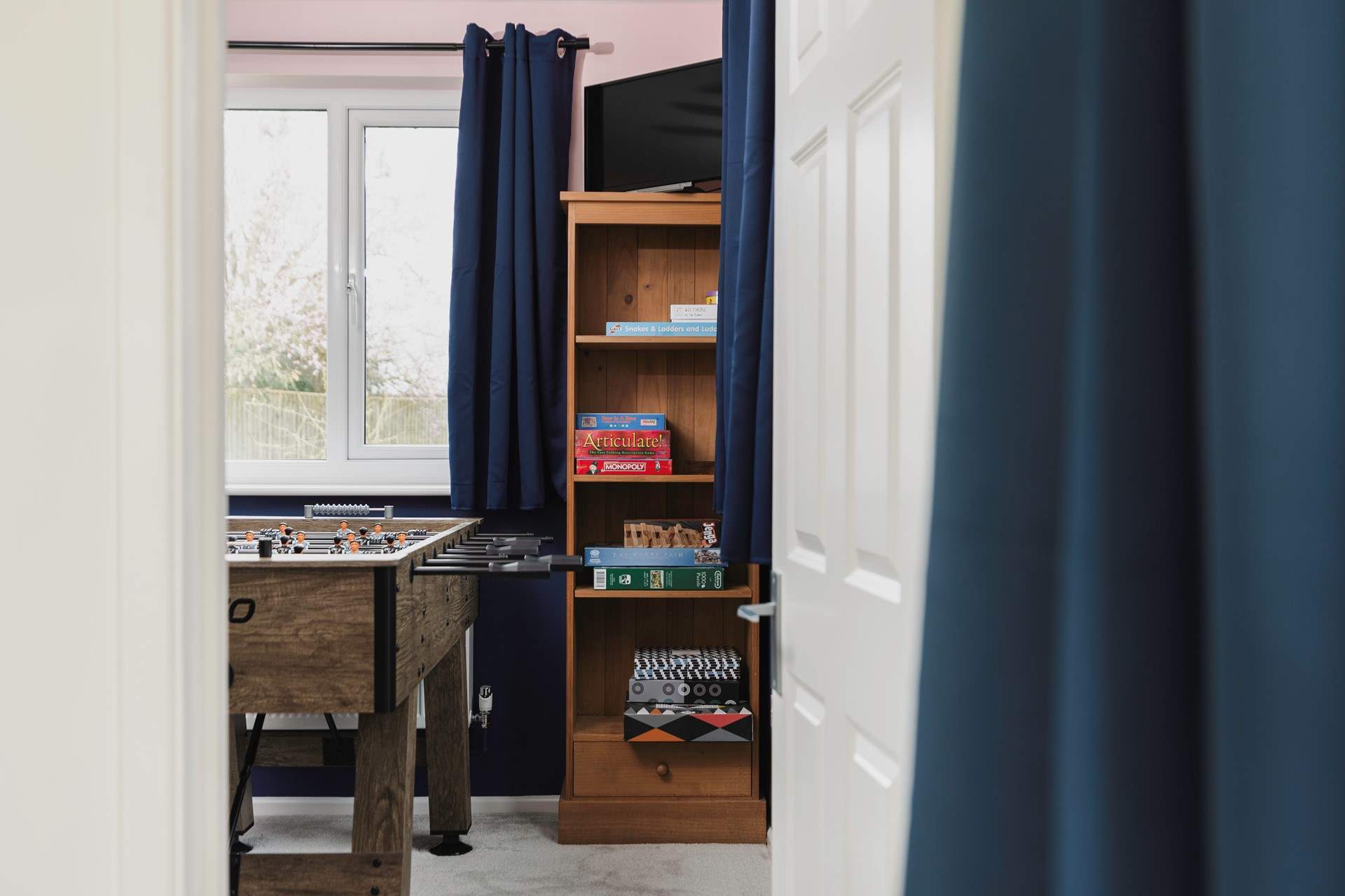 The games-room is off the sitting-room.