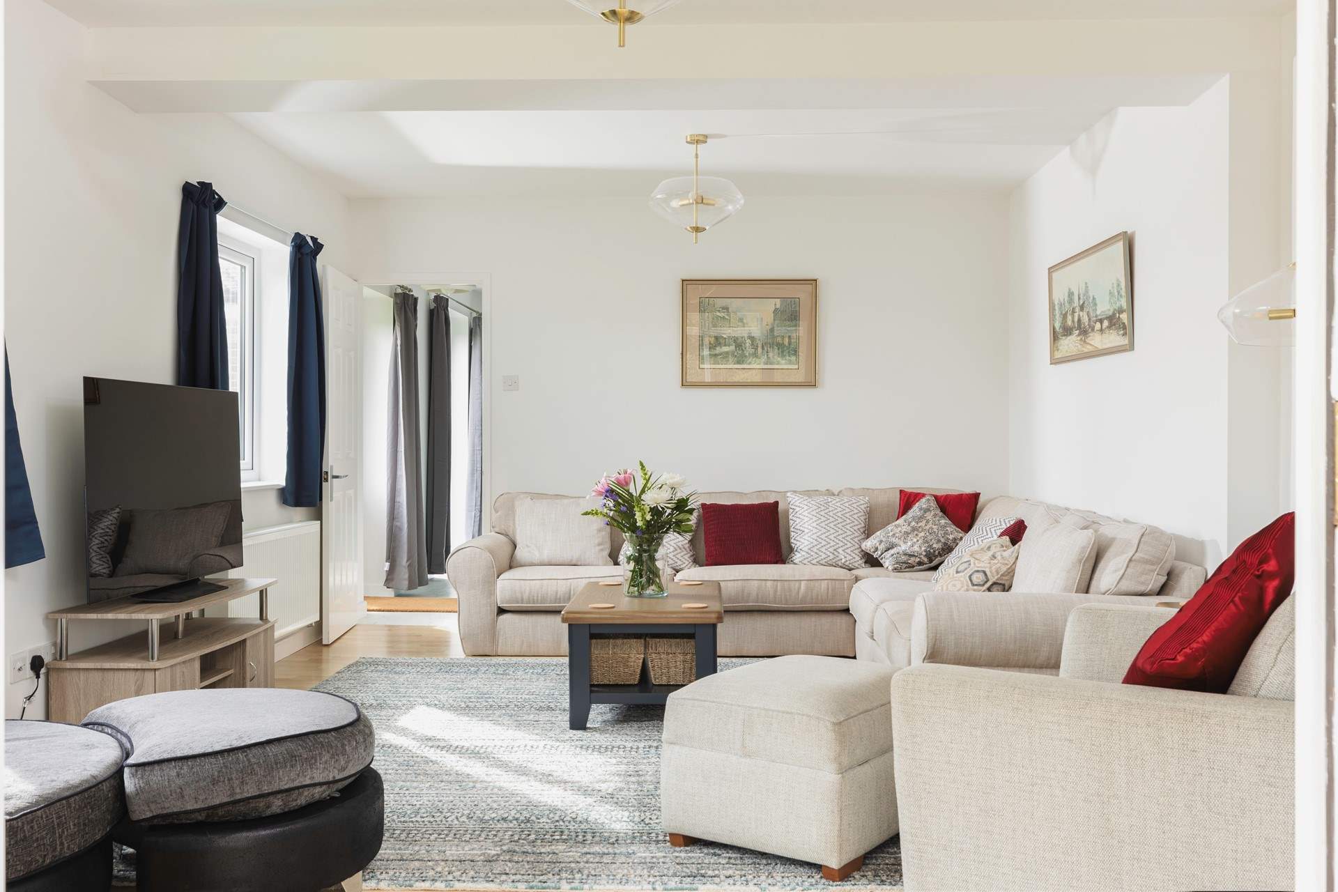 The sitting-room is light and airy.