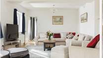 The sitting-room is light and airy.