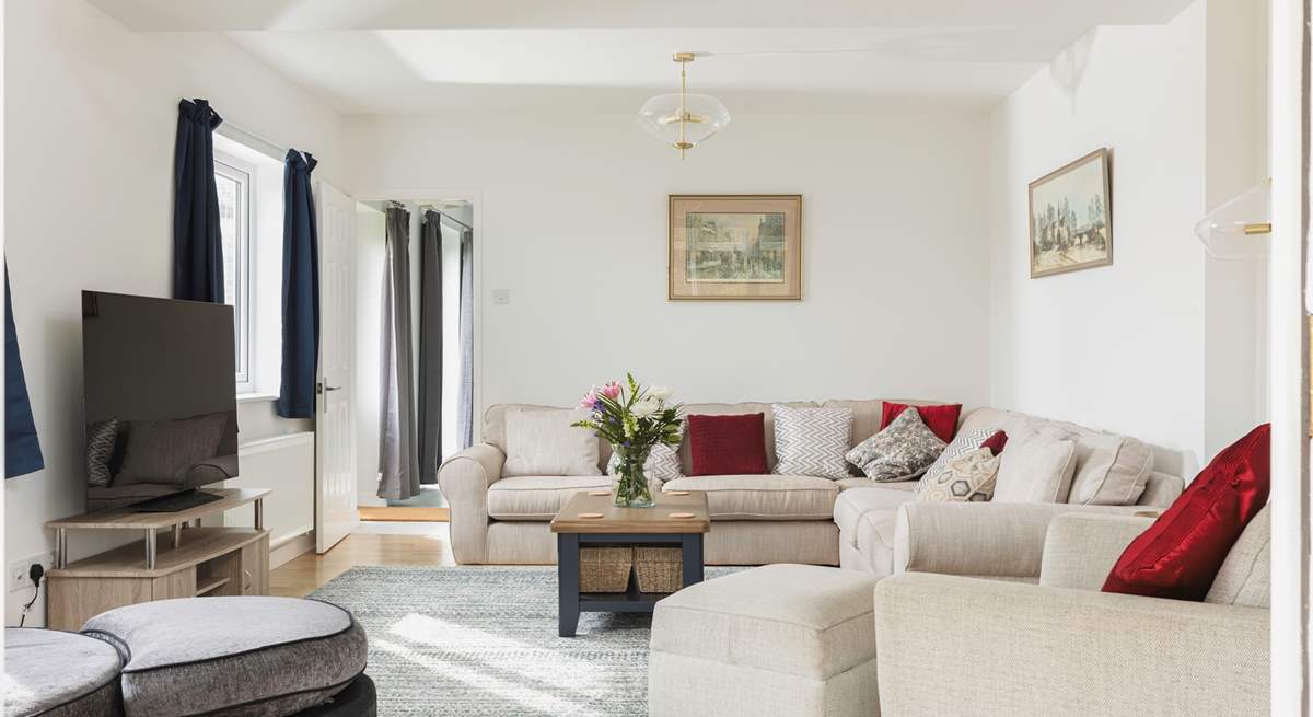 The sitting-room is light and airy.