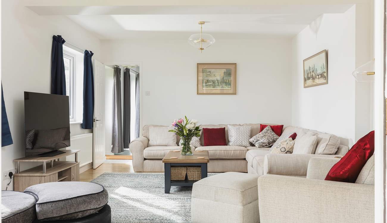 The sitting-room is light and airy.