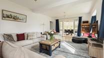 The comfy sofas invite you to relax after a day exploring.