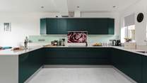 A kitchen with a wow factor, and the experience continues throughout this stunning home!