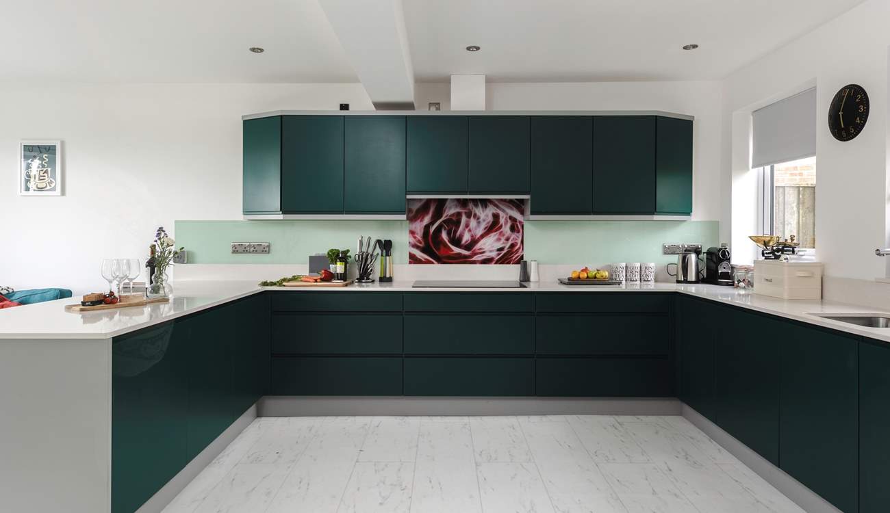 A kitchen with a wow factor, and the experience continues throughout this stunning home!