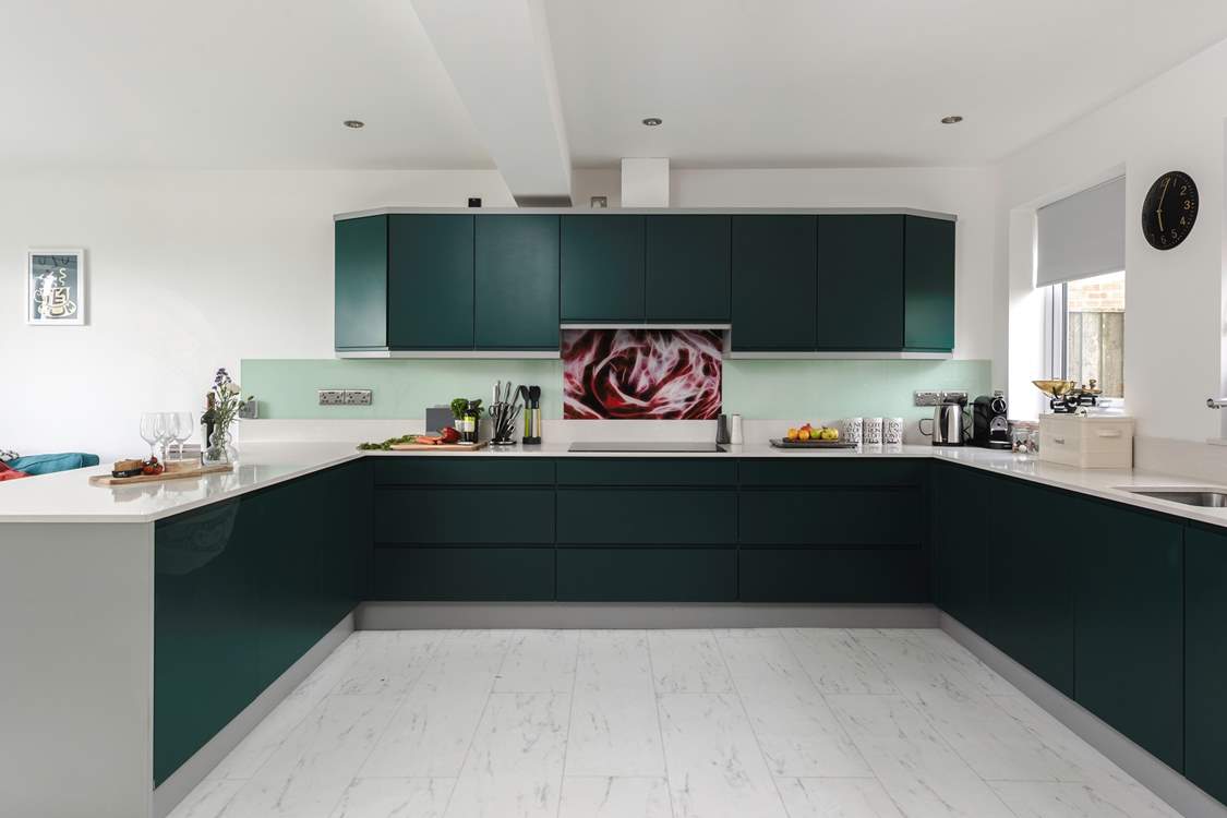 A kitchen with a wow factor, and the experience continues throughout this stunning home!