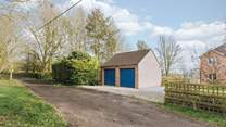There is parking at the front (the garage isn't accessible to guests). Four cars can be parked on the drive.