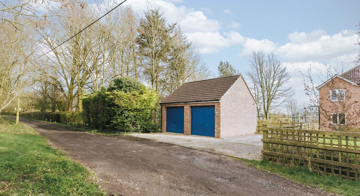 There is parking at the front (the garage isn't accessible to guests). Four cars can be parked on the drive.