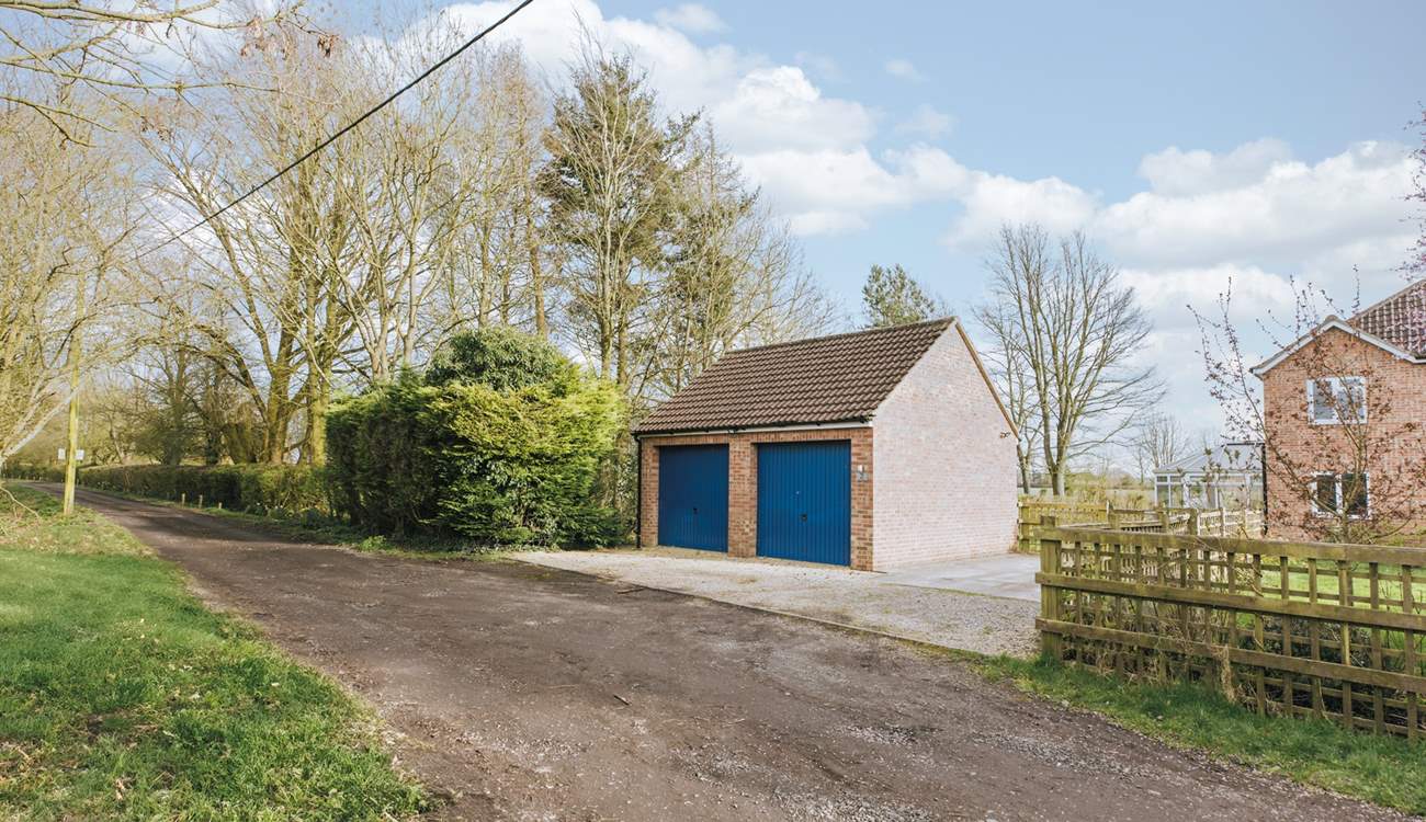 There is parking at the front (the garage isn't accessible to guests). Four cars can be parked on the drive.