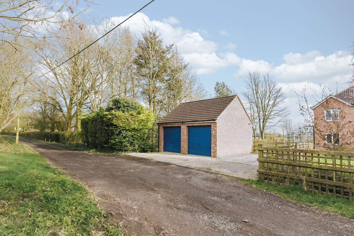 There is parking at the front (the garage isn't accessible to guests). Four cars can be parked on the drive.