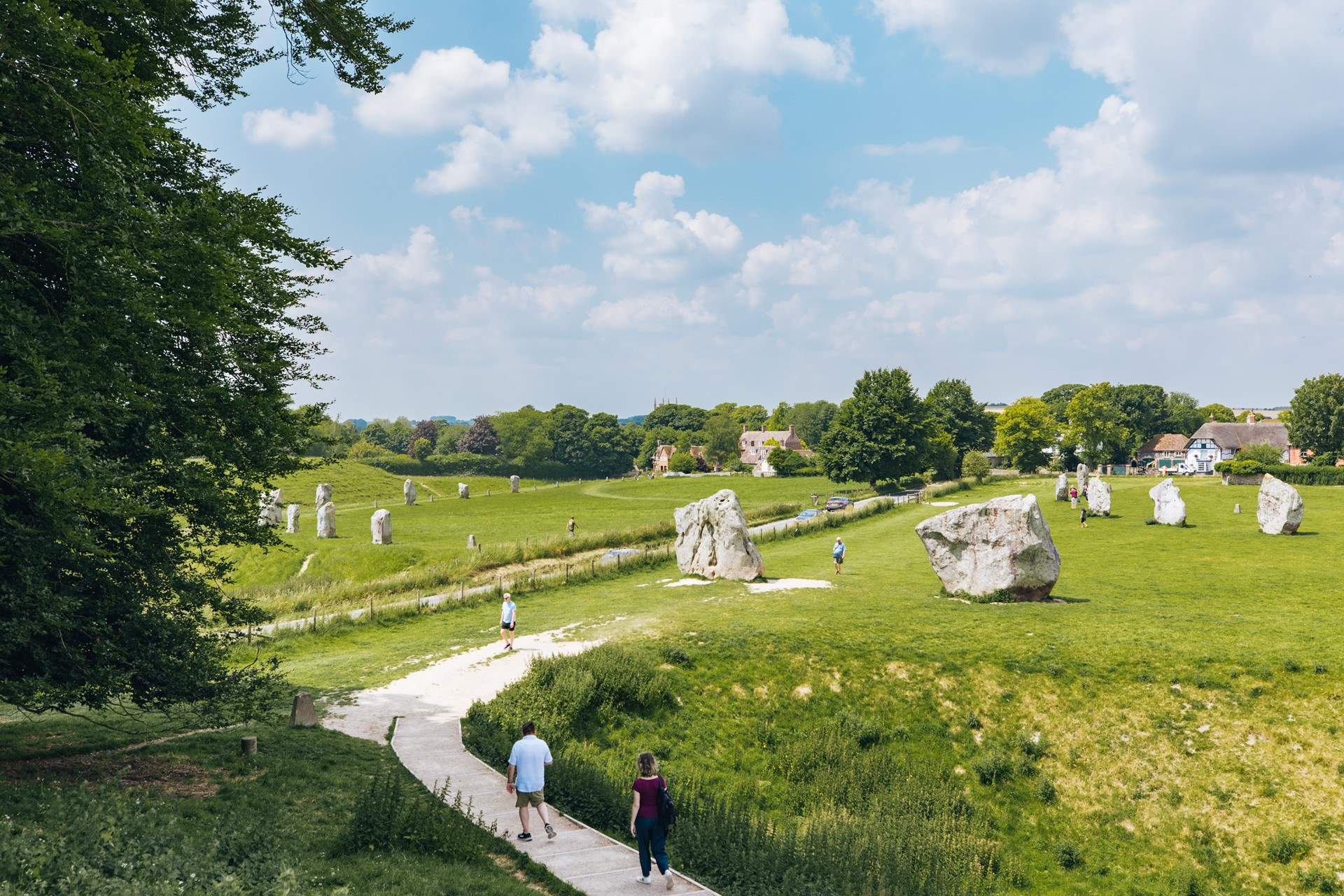 Visit Avebury and see the Neolithic henge monument containing three stone circles.