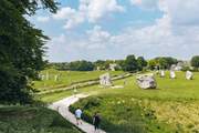 Visit Avebury and see the Neolithic henge monument containing three stone circles.