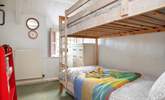 The little bunk-bedded room will delight your younger guests. - Thumbnail Image