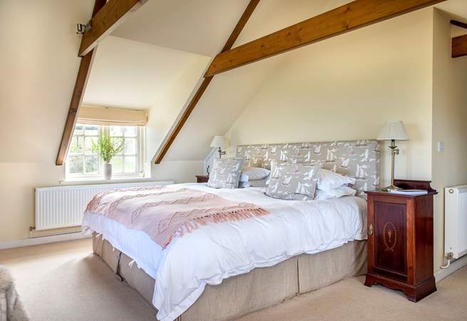 A super size, Emperor bed awaits in Bedroom One.