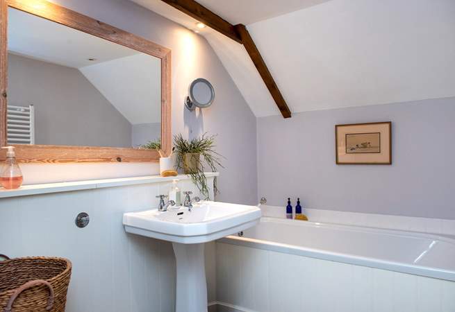 Bedroom One has the luxury of an en suite bathroom.