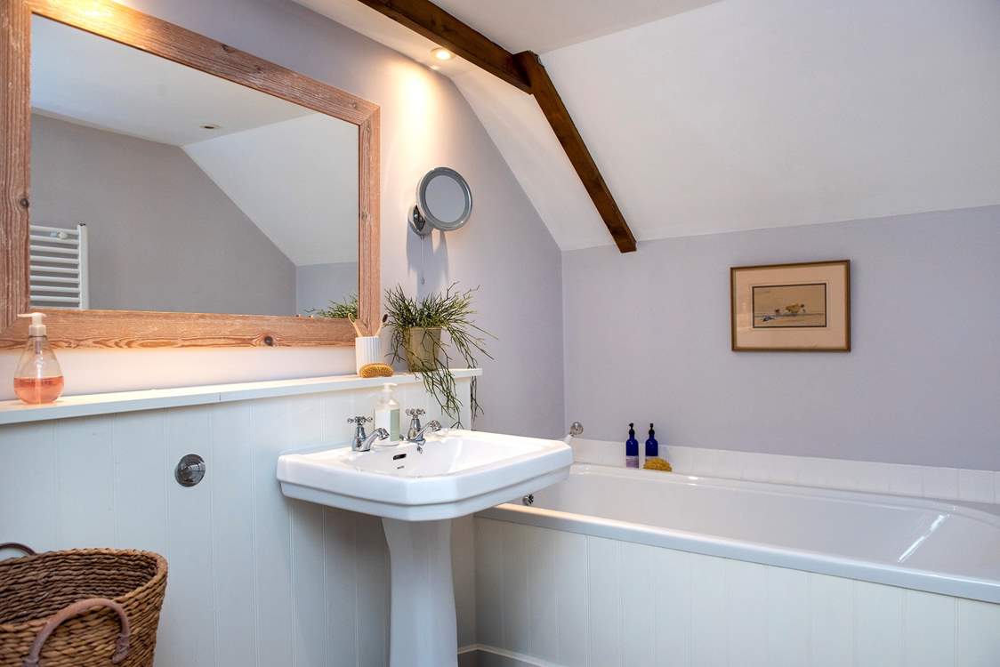 Bedroom One has the luxury of an en suite bathroom.