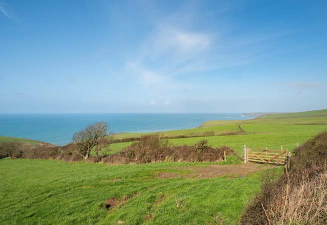 The spectacular view stretches out across open countryside and the coastline.