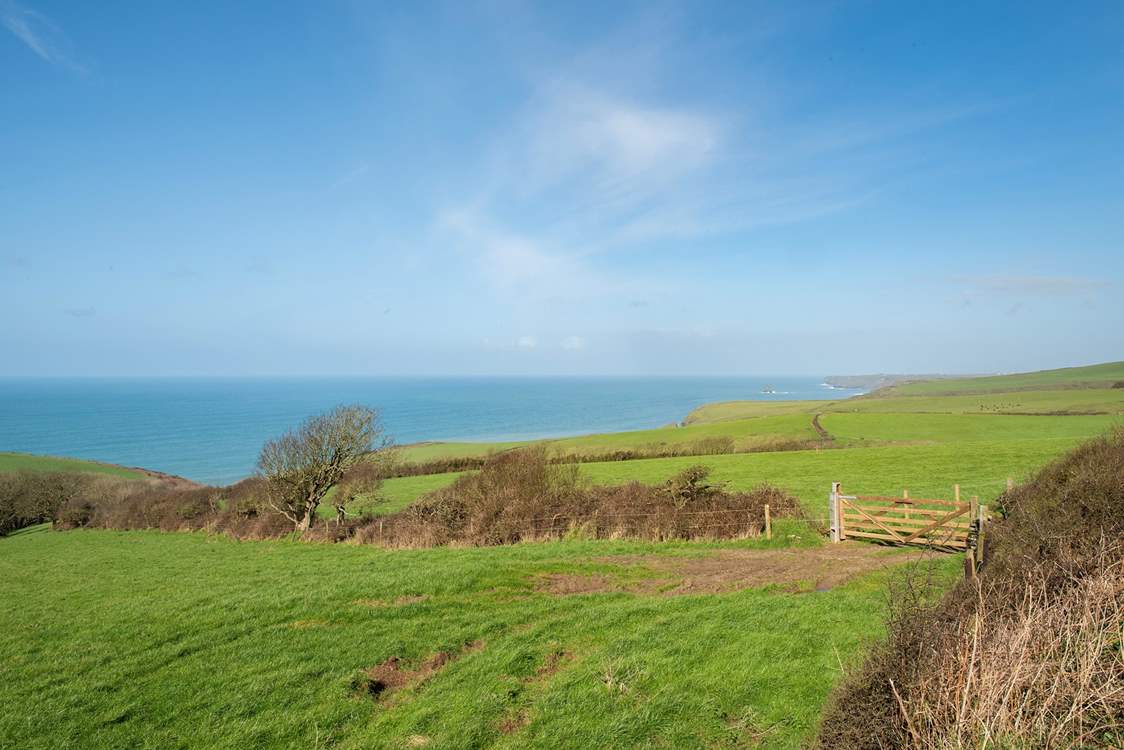 The spectacular view stretches out across open countryside and the coastline.