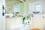 There's a further bathroom and a separate shower-room on the ground floor.