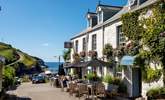 The little bay of Port Gaverne is reached just before Port Isaac. Make time to treat yourself to a drink or meal at the gastro pub in the Port Gaverne Hotel. - Thumbnail Image