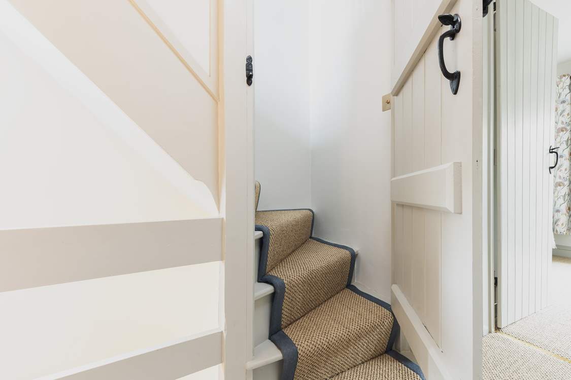The traditional cottage staircase is on the narrow side, please take care.