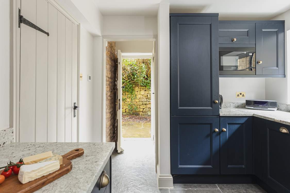 There is access to the courtyard area  via a kitchen side door...look out for that Bose sound system!