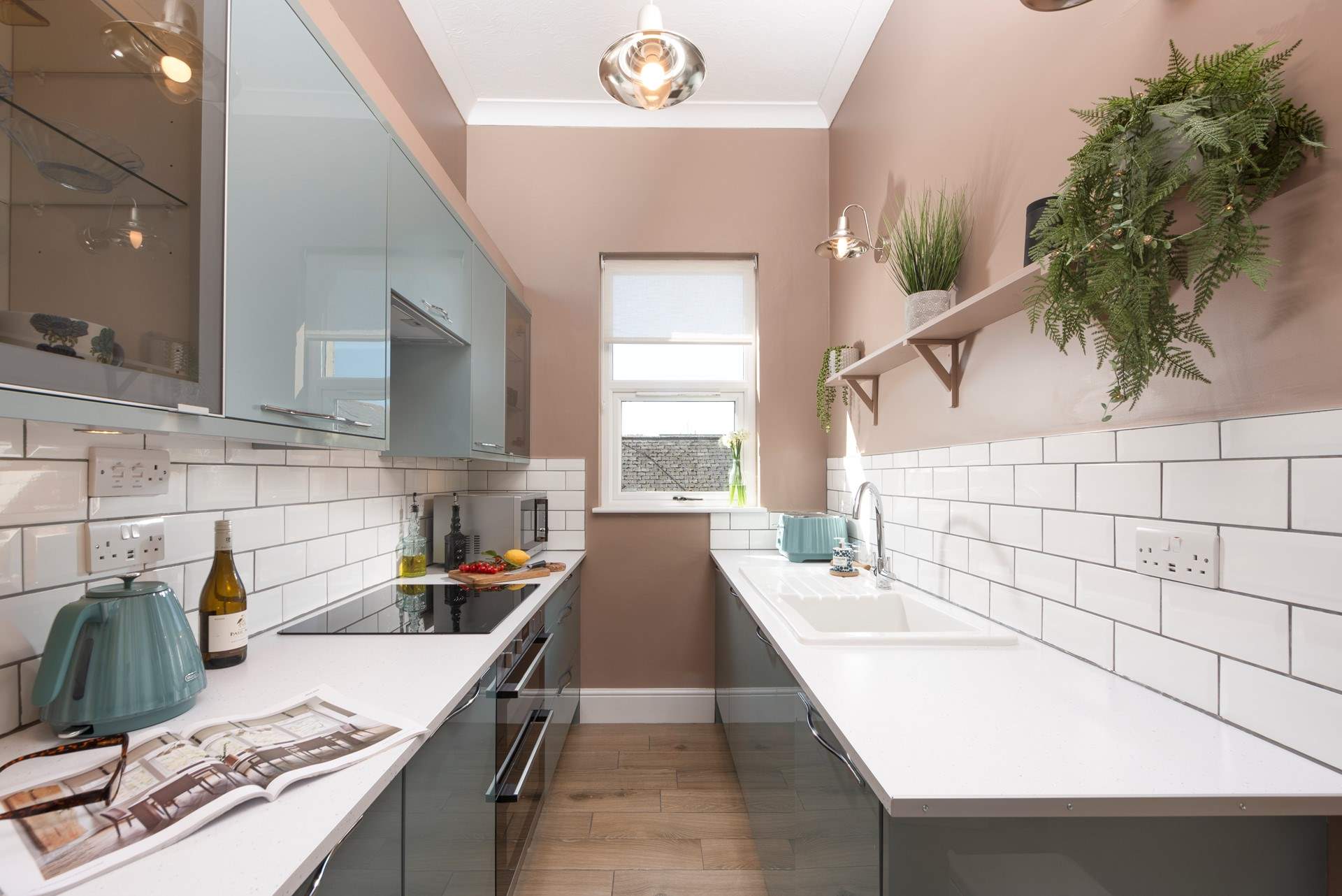 Stylish galley kitchen for a keen chef to cook up a Cornish feast.