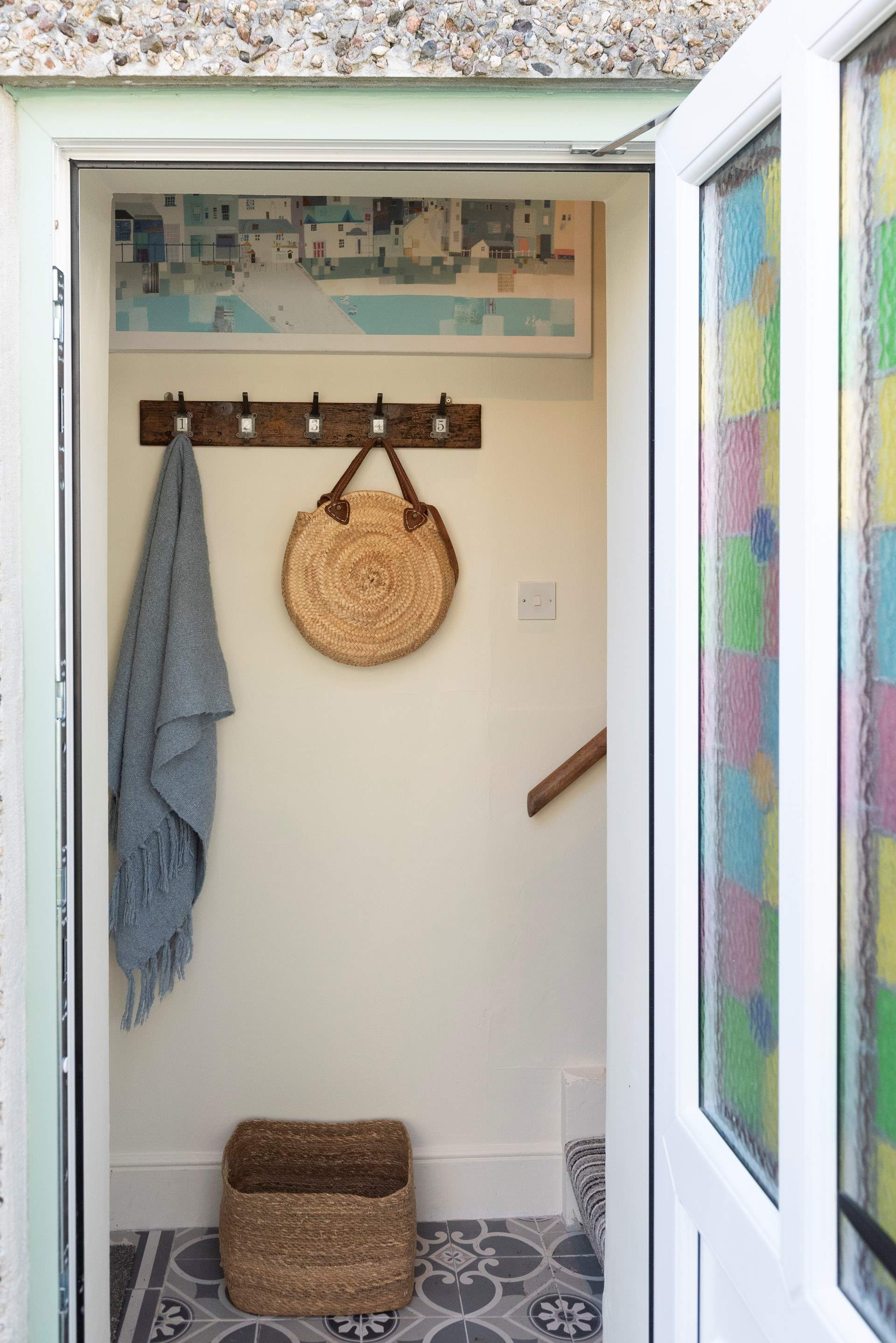 Slip off your shoes and hang your towels, head upstairs to relax in this gorgeous holiday home.