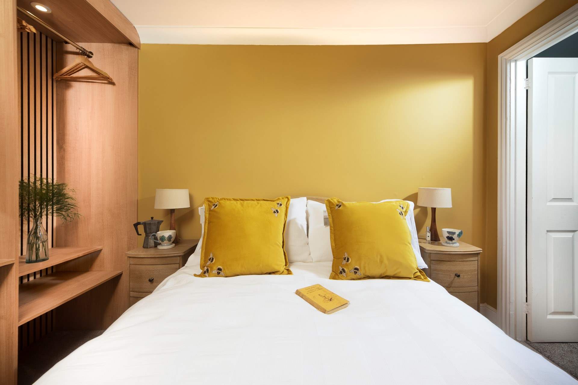 Bedroom 1 has a luxurious double bed with a unique open plan dressing space.