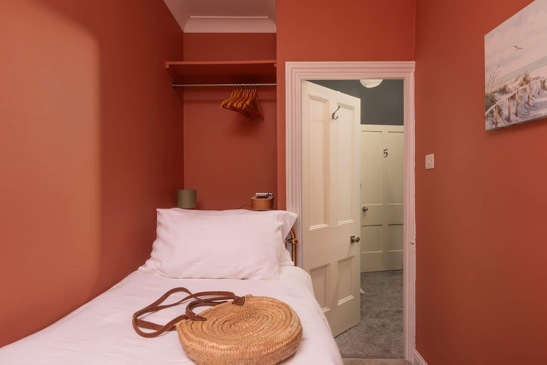 Bedroom 2 has a snug single bed with luxurious bed linen.