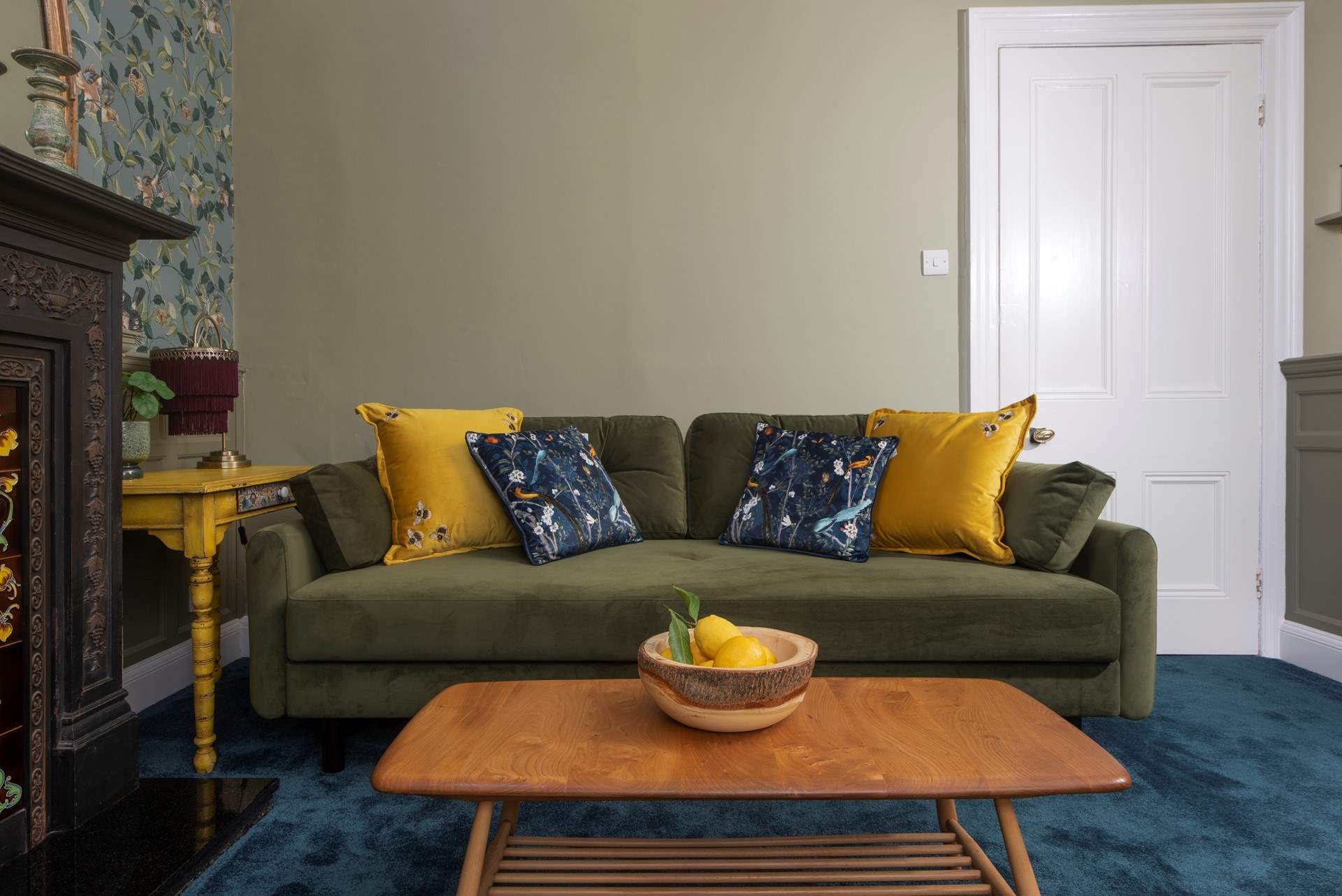 Snuggle down on the sumptuous velvet sofa.