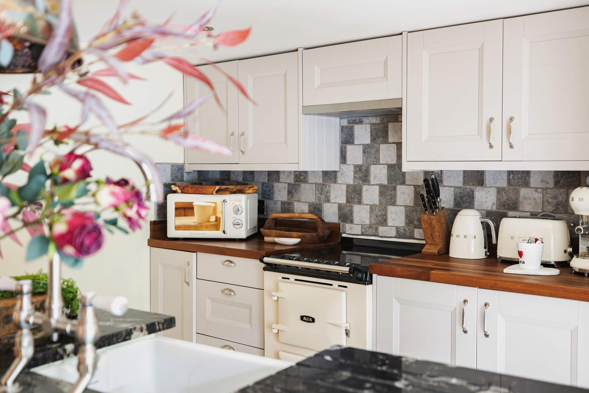 Cook up a culinary treat in this lovely kitchen.