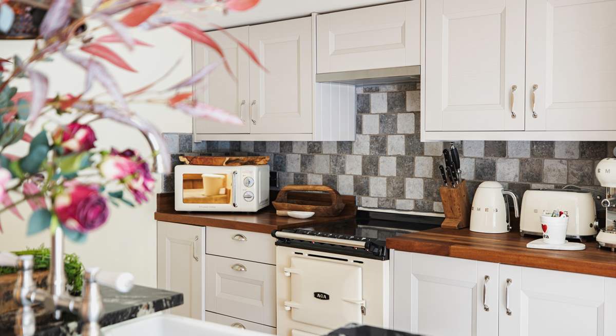 Cook up a culinary treat in this lovely kitchen.