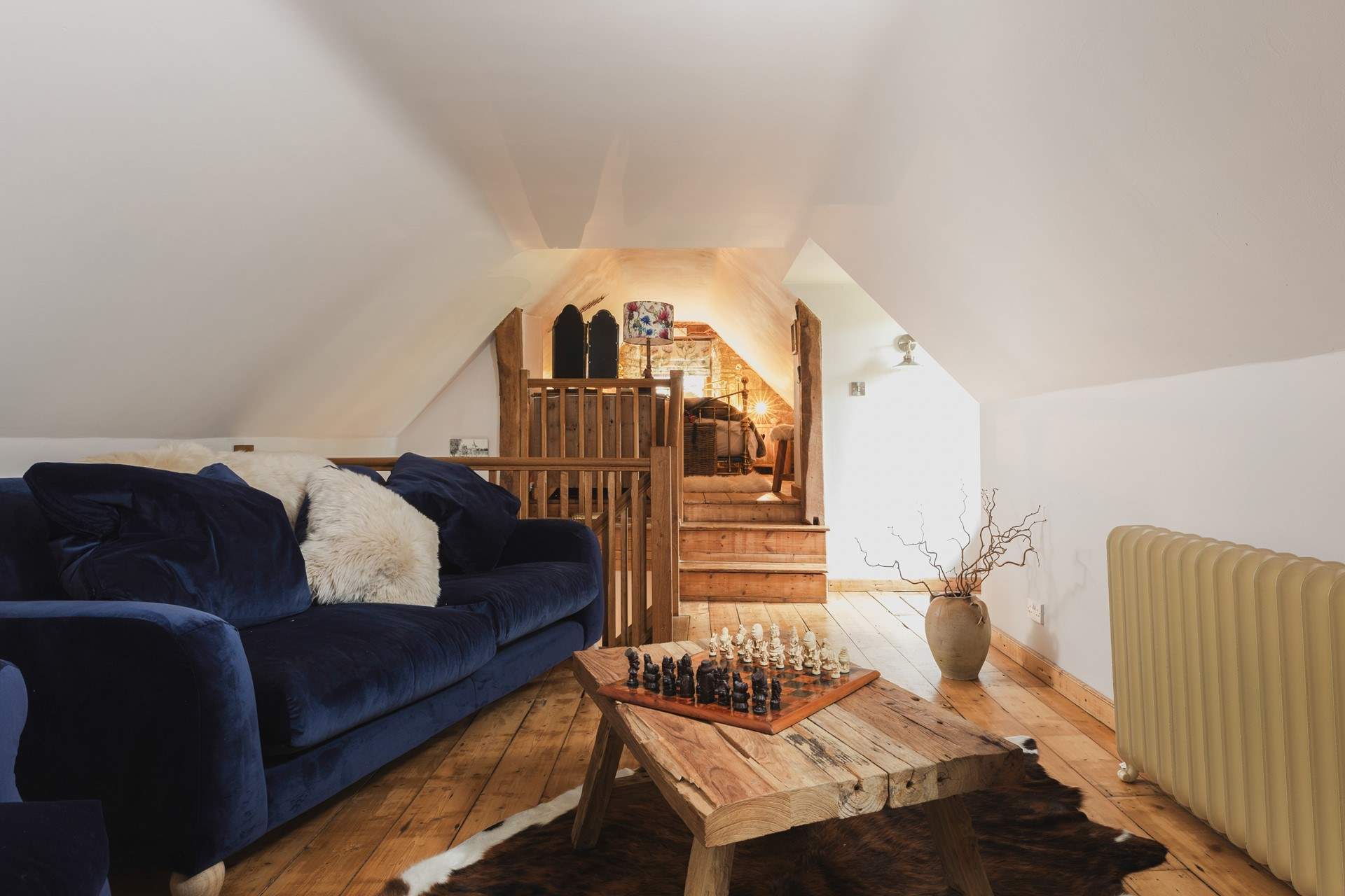 Open plan split-level living and sleeping space.