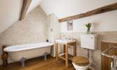 Stylish en suite bathroom to bedroom four, please note the ceiling slopes. - Thumbnail Image