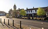 Historic Thirsk town centre, note the knitted tops of the bollards, that's the Thirsk Yarn Bombers at work! - Thumbnail Image