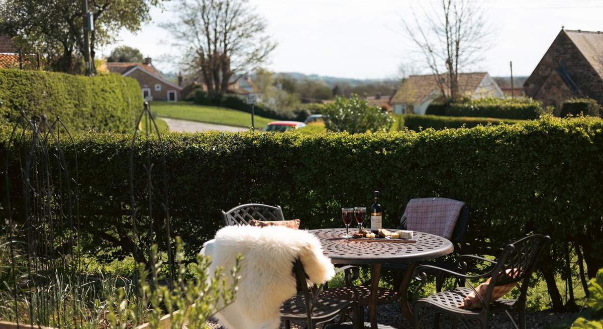 The garden is a picture of greenery and plants.