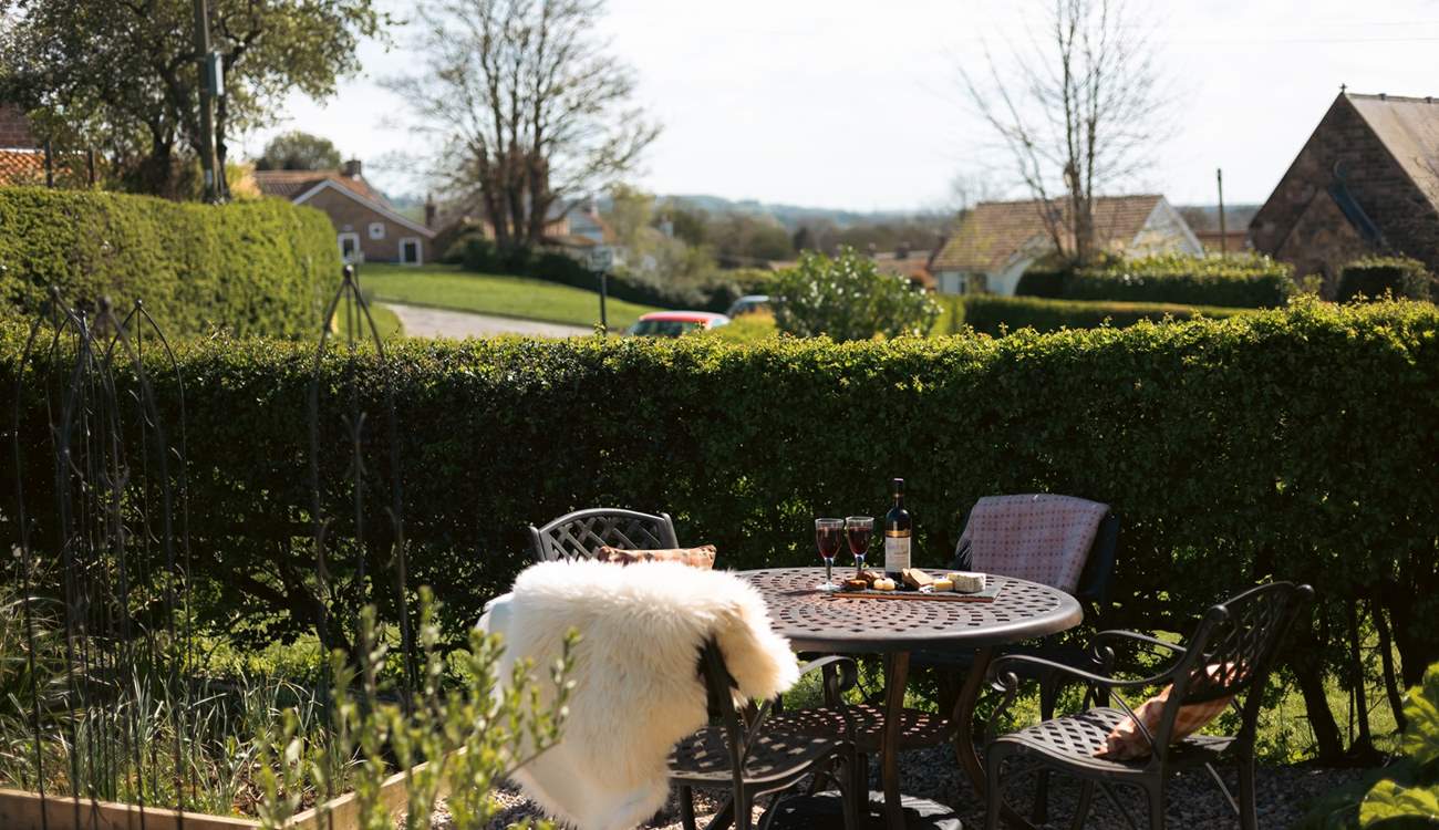 The garden is a picture of greenery and plants.