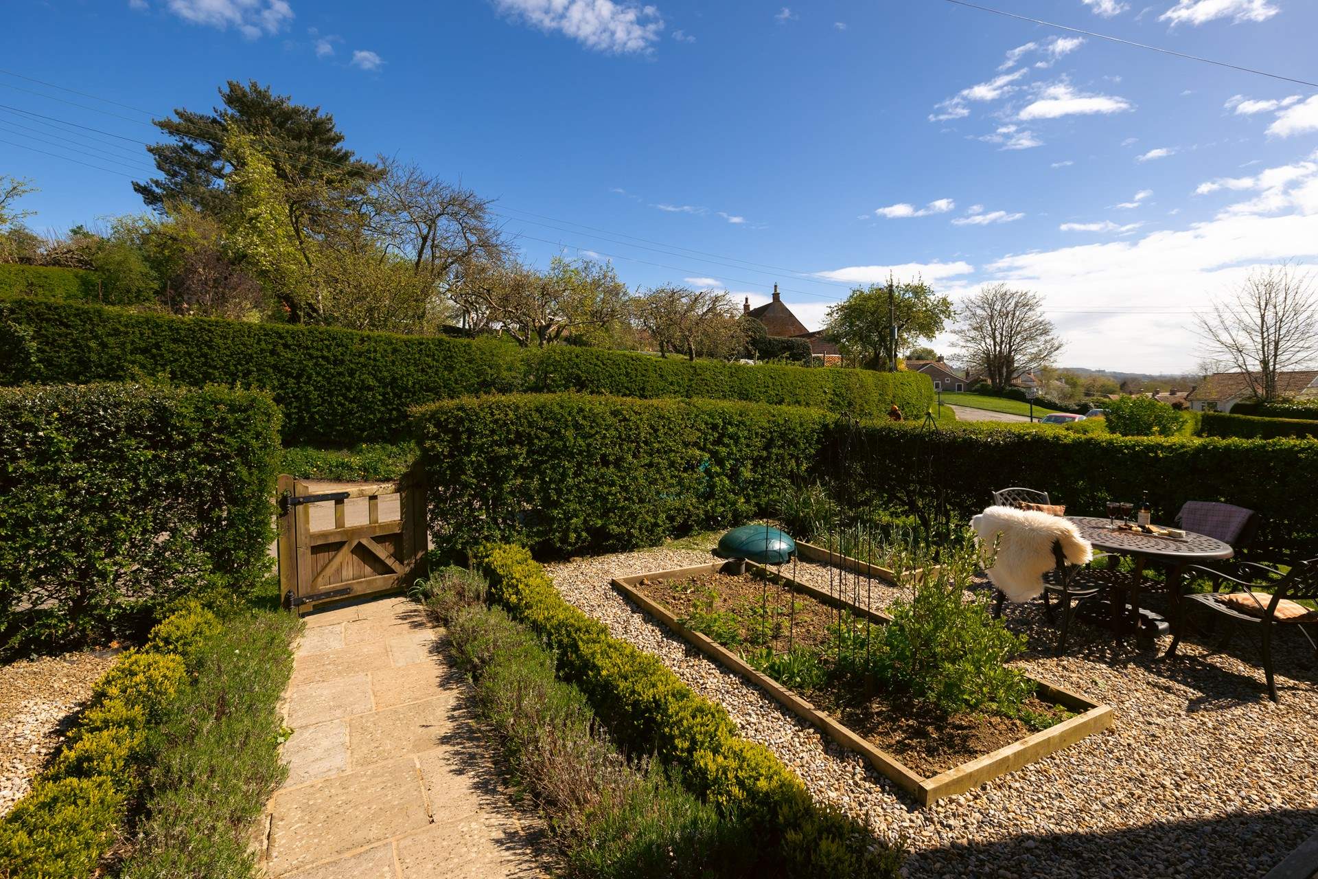The garden is full of strawberries and herbs for you to enjoy.