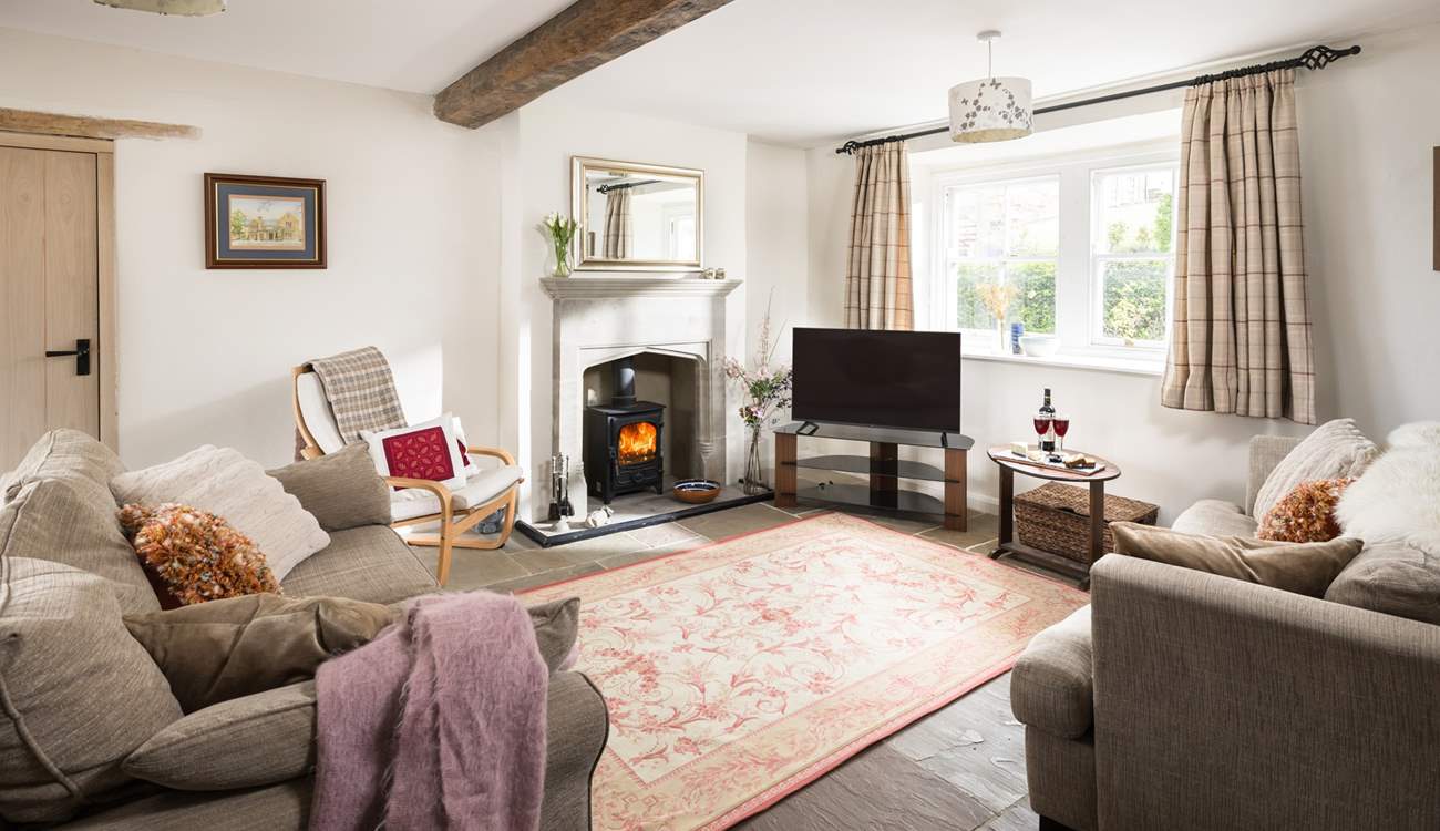 Relax in the cosy sitting-room.